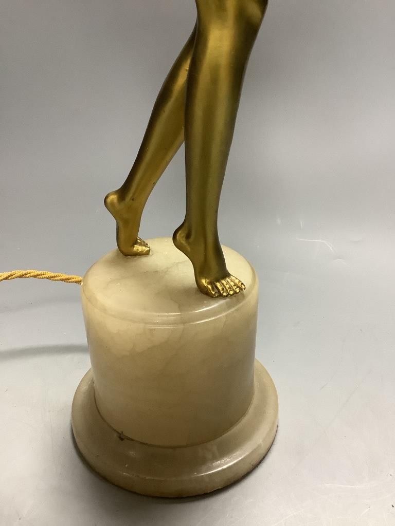 A Lorenzl style gilt metal figural table lamp, height 60cm